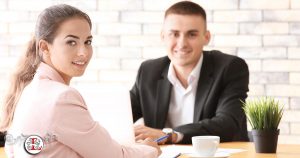 woman and man consulting at work