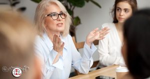 woman talking to group