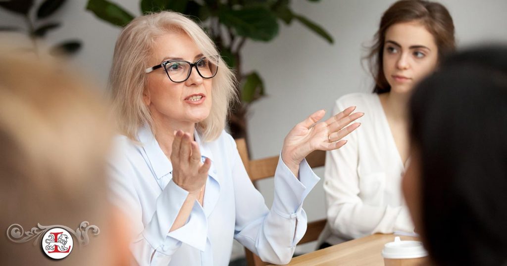 woman communicating to team