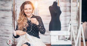 woman sewing to upcycle