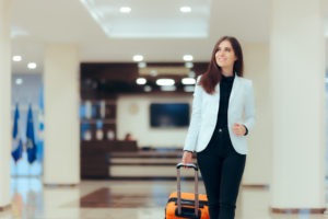 An elegant personal grooming business woman travelling for work